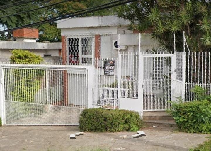 Casa com 200m², 3 dormitórios, 1 suíte, 2 vagas no bairro Santa Tereza em Porto Alegre para Comprar