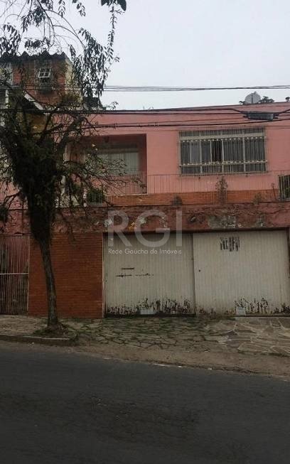 Casa com 170m², 3 dormitórios, 1 suíte, 3 vagas no bairro Partenon em Porto Alegre para Comprar