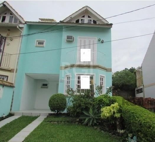 Casa Condominio com 165m², 3 dormitórios, 1 suíte, 2 vagas no bairro Guarujá em Porto Alegre para Comprar